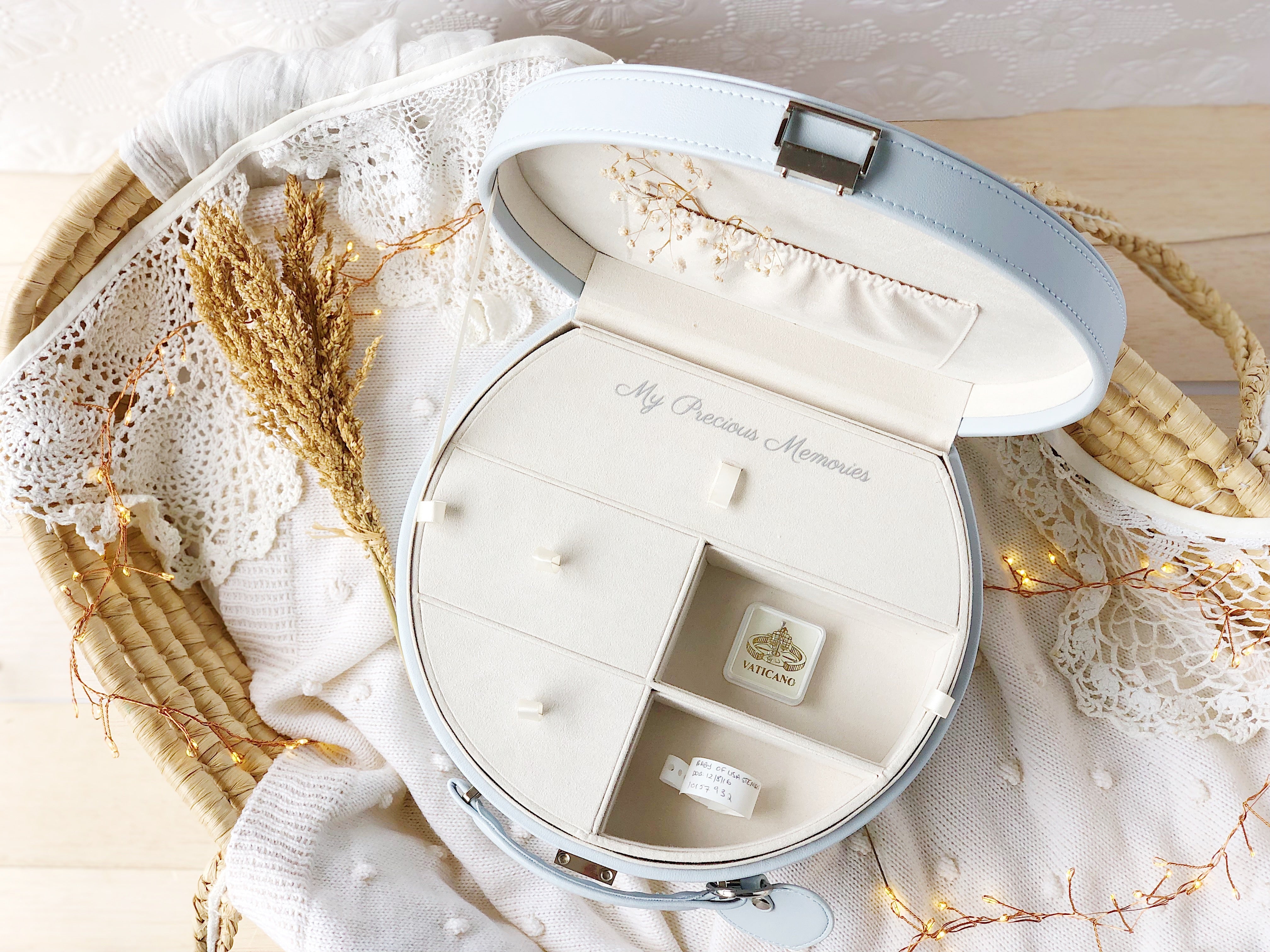 a grey keepsake box open showing the compartment tray inside