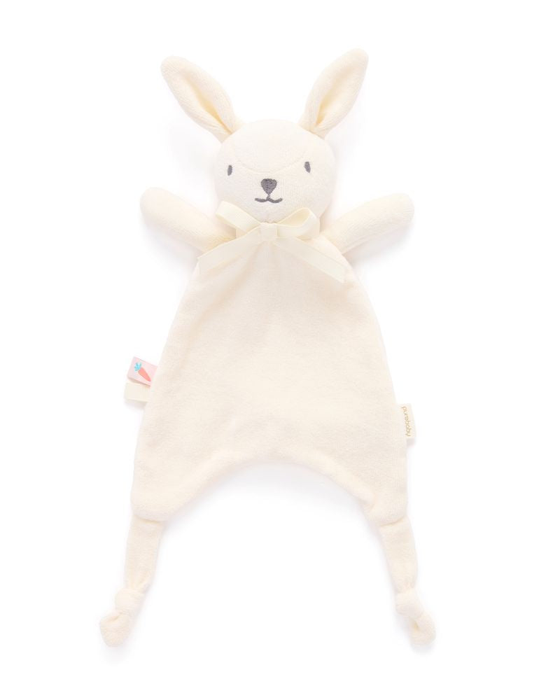 A cream-colored plush bunny security blanket with long ears, a matching fabric bow, and integrated footed legs, shown on a plain white background.