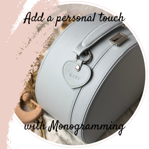 grey keepsake box showing a monogrammed heart shaped tag