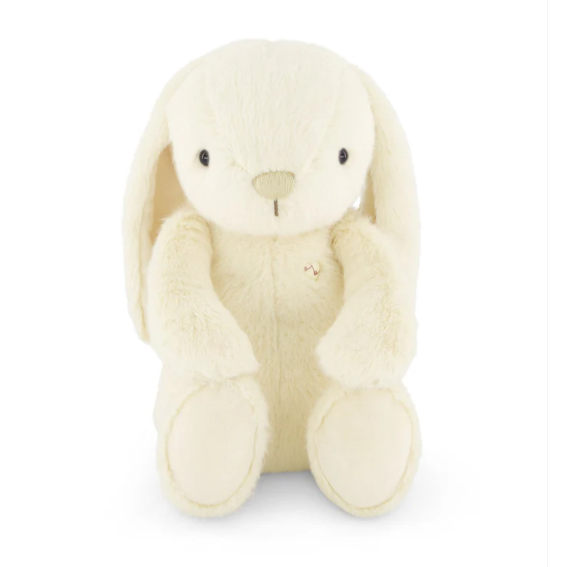 Cream-colored plush bunny toy on a white background