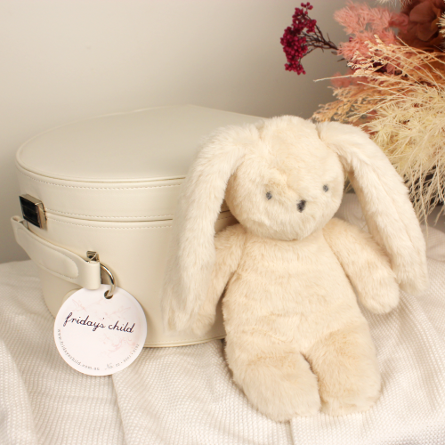 ivory coloured plush bunny sitting next to a cream keepsake box