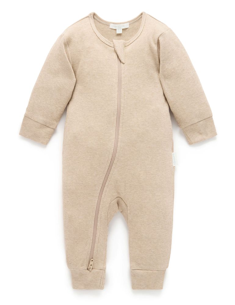 A long-sleeve baby romper in a soft, heathered light beige or oatmeal color, featuring a front zipper closure, ribbed cuffs, and a ribbed foot, shown against a plain white background.