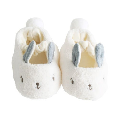 fluffy bunny slippers with grey ears on white background