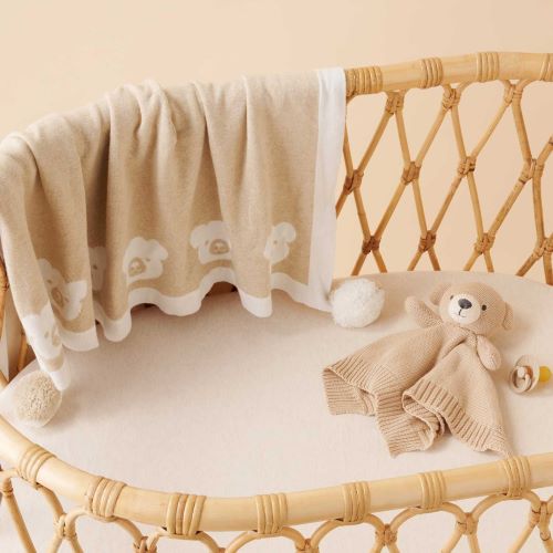 knitted bear comforter styled in cot
