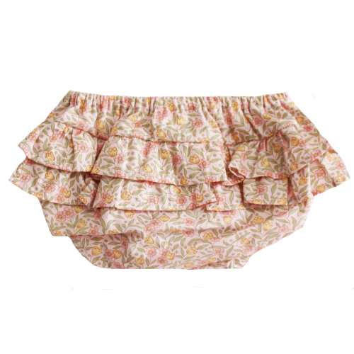 A pair of ruffled diaper cover or bloomers with a delicate floral pattern in pink, yellow, and green on a light beige background, shown against a plain white background.