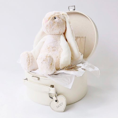 cream coloured plush toy bunny sitting in cream keepsake box