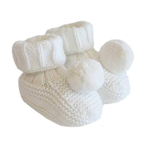 knitted baby booties with pom poms on toes