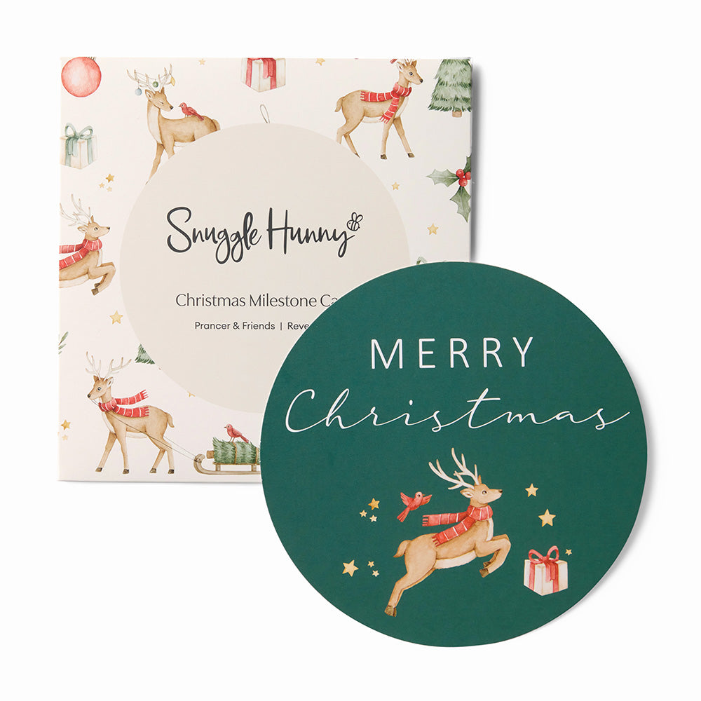 Christmas-themed milestone card with reindeer and gift design, featuring 'Snuggle Hunny' brand.