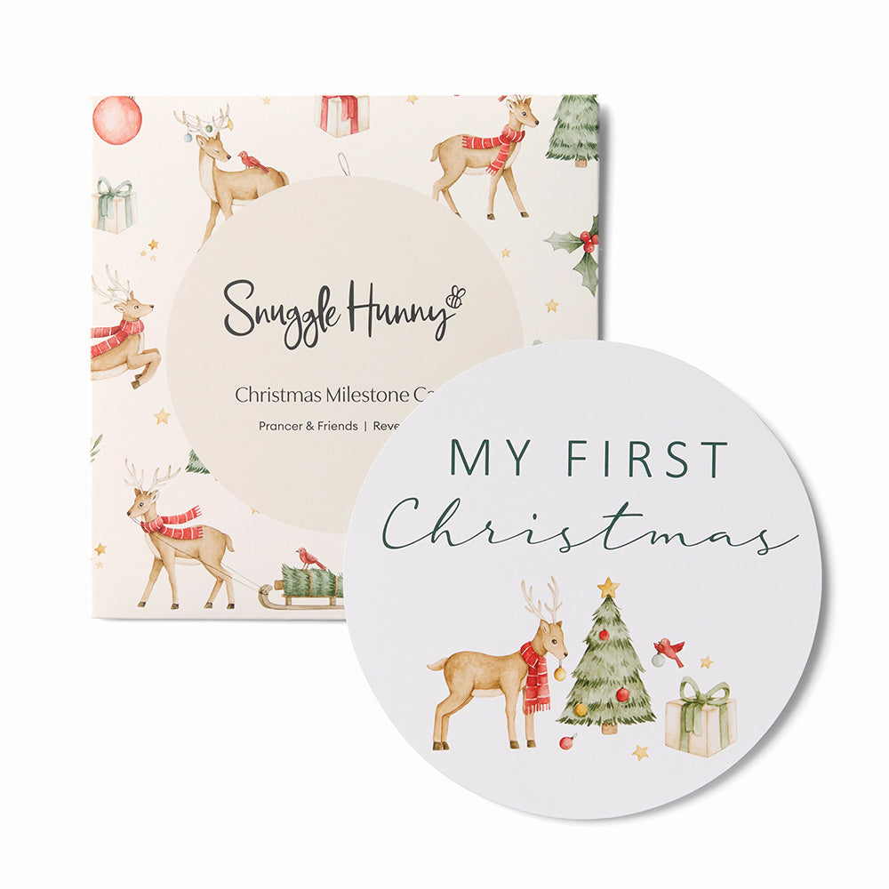 Round 'My First Christmas' milestone card with deer and tree design, next to a 'Snuggle Hunny' milestone card.
