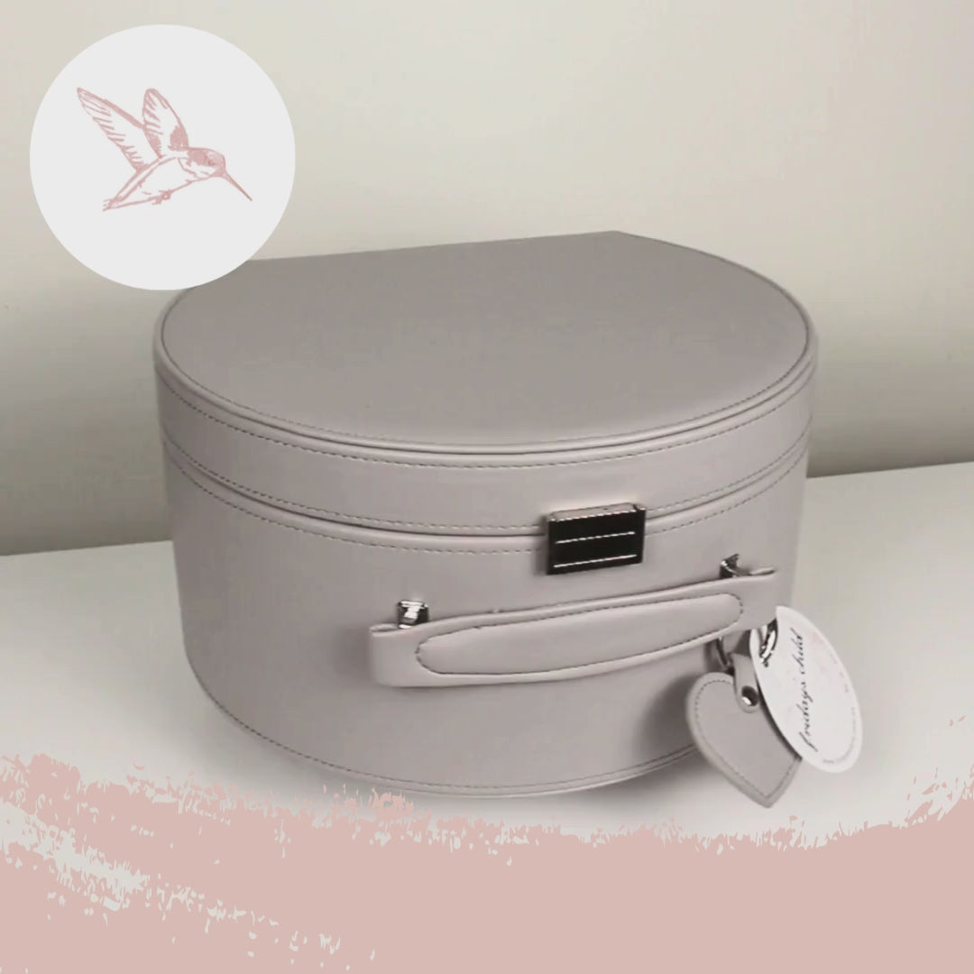 grey keepsake box on rotation in video