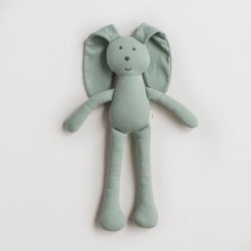 flat lay image of sage snuggle bunny toy on white background