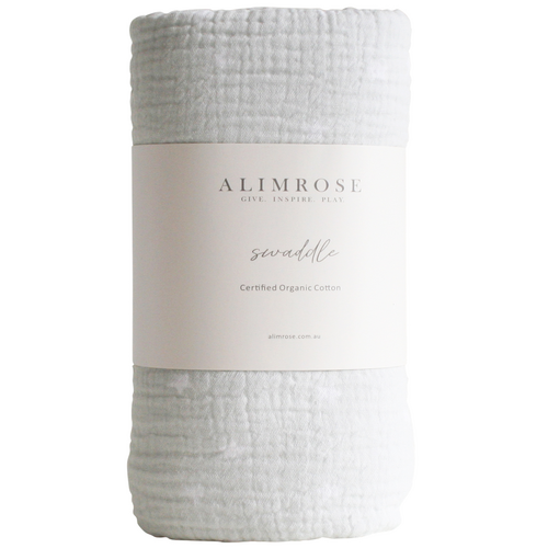 grey muslin wrap in belly band with label