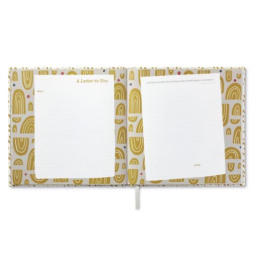 gold and white page inside journal for letter writing